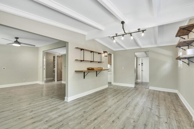 825 Northern Dr, Lake Park, FL 33403 - unfurnished living room featuring light wood-style floors, ceiling fan, and baseboards