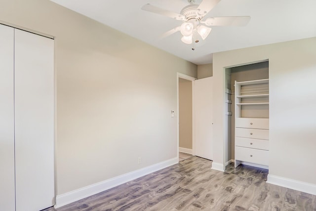 825 Northern Dr, Lake Park, FL 33403 - unfurnished bedroom featuring light wood-style floors, baseboards, and ceiling fan