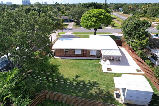 825 Northern Dr, Lake Park, FL 33403 - view of subject property featuring a tree filled landscape