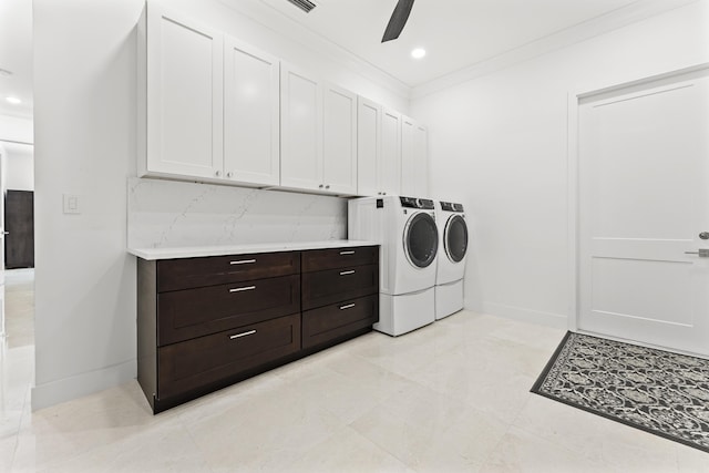 14819 Broken Arrow Pl, Palm Beach Gardens, FL 33418 - laundry area with washer and clothes dryer, cabinet space, a ceiling fan, crown molding, and baseboards
