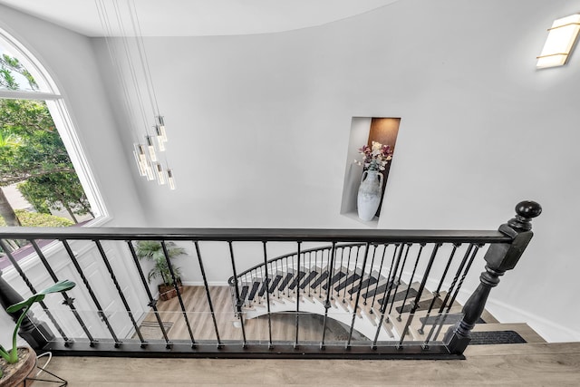 staircase featuring baseboards