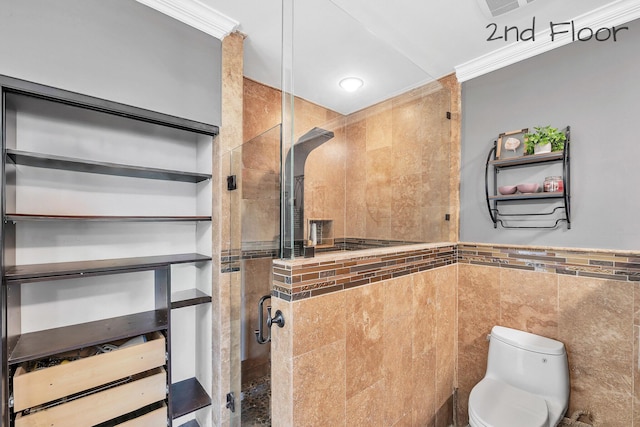 bathroom featuring tile walls, a shower stall, toilet, and recessed lighting