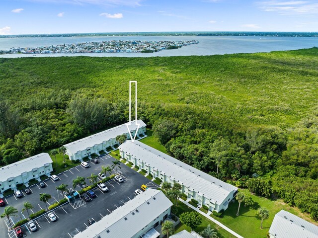 9421 S Ocean Dr Unit 84, Jensen Beach, FL 34957 - aerial view of a nearby body of water and a forest