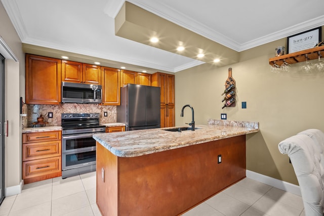6824 68th Way, West Palm Beach, FL 33409 - kitchen with appliances with stainless steel finishes, a sink, a peninsula, backsplash, and crown molding