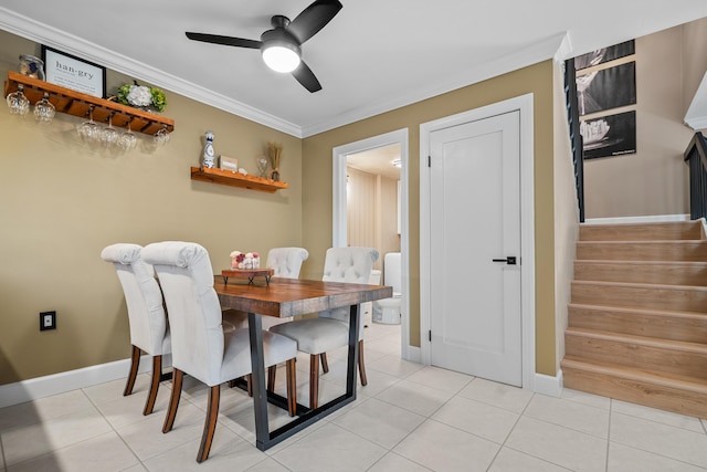 6824 68th Way, West Palm Beach, FL 33409 - dining area featuring a ceiling fan, crown molding, stairs, baseboards, and light tile patterned floors