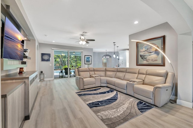 1236 SE Conference Cir, Stuart, FL 34997 - living room featuring ceiling fan, light wood-style floors, and recessed lighting