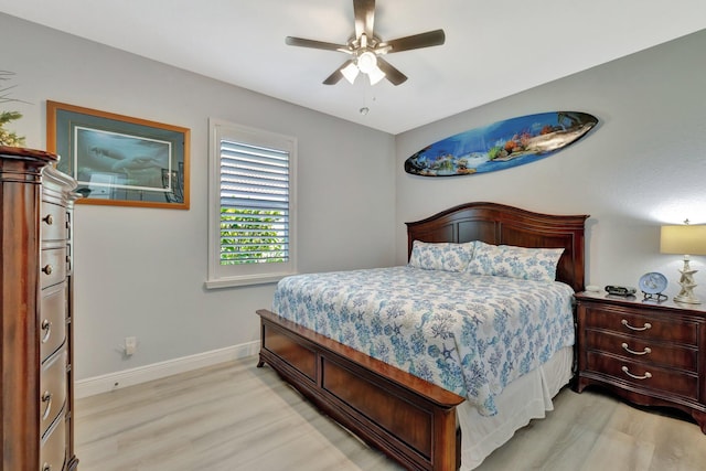 1236 SE Conference Cir, Stuart, FL 34997 - bedroom featuring light wood-style flooring and ceiling fan