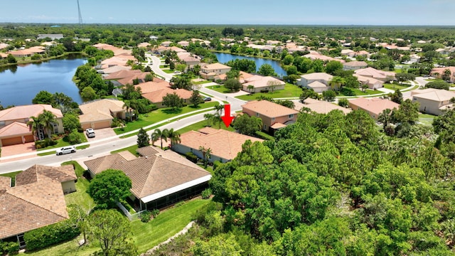 1236 SE Conference Cir, Stuart, FL 34997 - aerial view of residential area featuring a nearby body of water