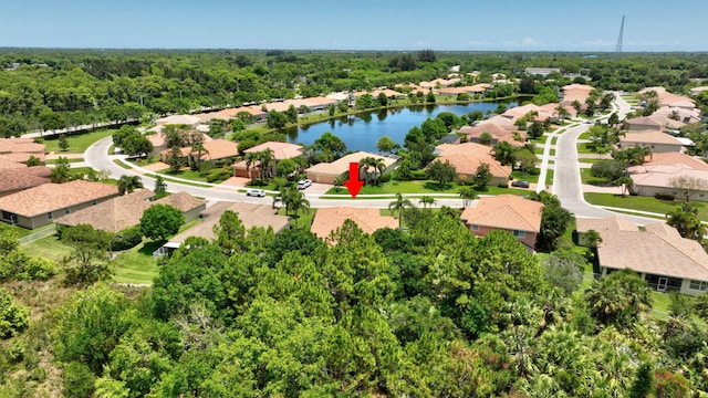 1236 SE Conference Cir, Stuart, FL 34997 - aerial perspective of suburban area with a large body of water