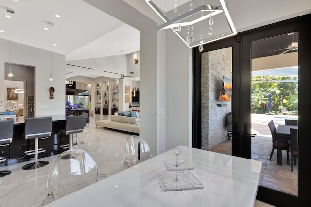 2783 Rhone Dr, Palm Beach Gardens, FL 33410 - dining space featuring a high ceiling, marble tiled flooring, and recessed lighting