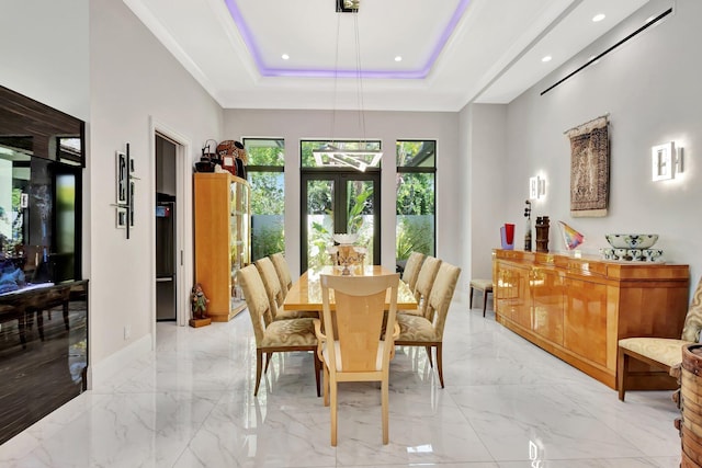 2783 Rhone Dr, Palm Beach Gardens, FL 33410 - dining room with light marble finish floors, recessed lighting, and a raised ceiling