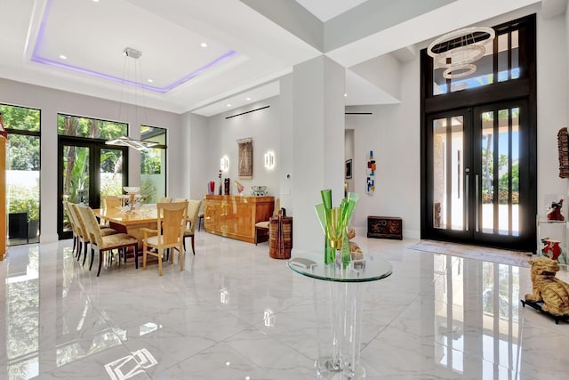 2783 Rhone Dr, Palm Beach Gardens, FL 33410 - community lobby featuring a towering ceiling and recessed lighting