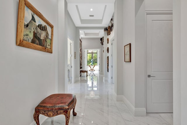 2783 Rhone Dr, Palm Beach Gardens, FL 33410 - corridor with light marble finish floors, a raised ceiling, and baseboards