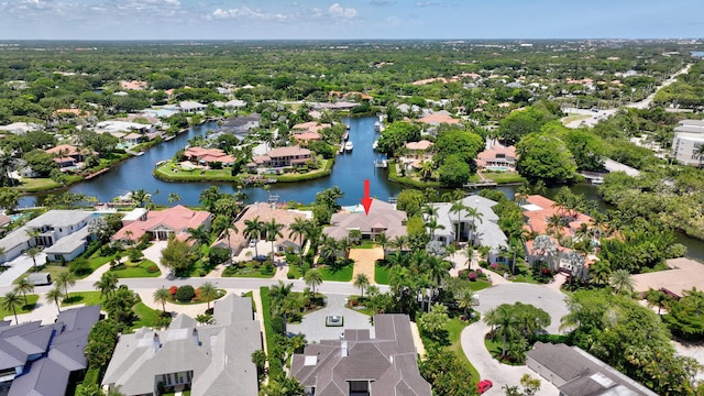 2783 Rhone Dr, Palm Beach Gardens, FL 33410 - aerial overview of property's location with nearby suburban area and a nearby body of water