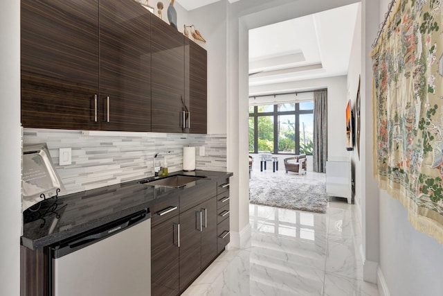 2783 Rhone Dr, Palm Beach Gardens, FL 33410 - indoor wet bar featuring dishwasher, light marble finish floors, backsplash, baseboards, and a tray ceiling