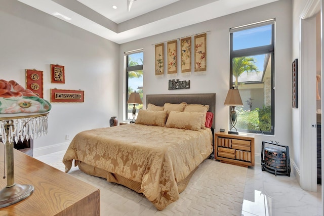 2783 Rhone Dr, Palm Beach Gardens, FL 33410 - bedroom featuring multiple windows, light marble finish floors, baseboards, and recessed lighting