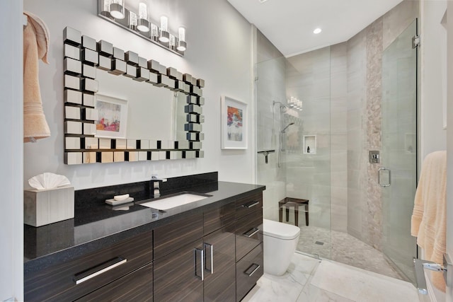 2783 Rhone Dr, Palm Beach Gardens, FL 33410 - full bathroom with vanity, toilet, a shower stall, and marble look tiles