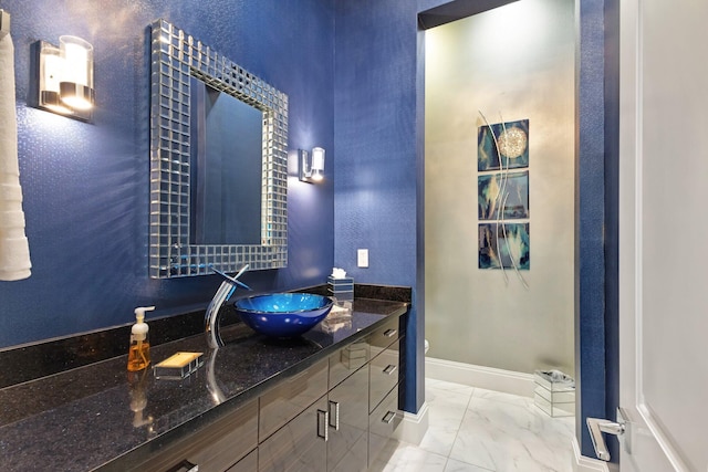2783 Rhone Dr, Palm Beach Gardens, FL 33410 - bathroom with vanity, marble finish floors, toilet, and baseboards