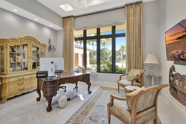 2783 Rhone Dr, Palm Beach Gardens, FL 33410 - home office featuring light marble finish floors, baseboards, a skylight, and recessed lighting