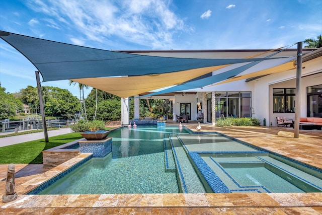 2783 Rhone Dr, Palm Beach Gardens, FL 33410 - view of swimming pool with a patio area and a pool with connected hot tub