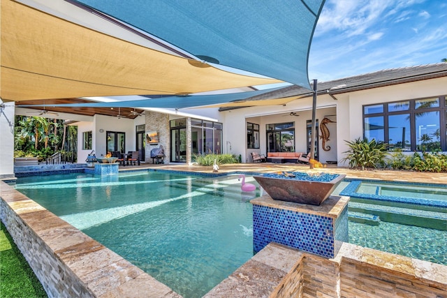 2783 Rhone Dr, Palm Beach Gardens, FL 33410 - swimming pool with ceiling fan, an in-ground hot tub, a patio, and french doors