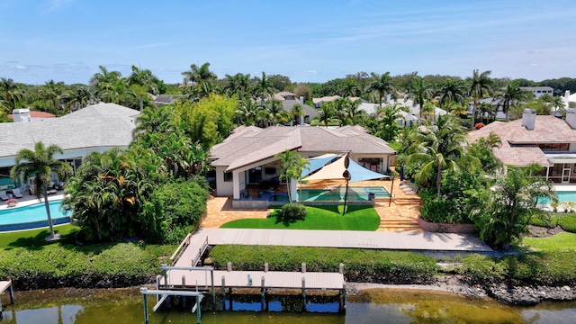 2783 Rhone Dr, Palm Beach Gardens, FL 33410 - view from above of property with a pool and a large body of water