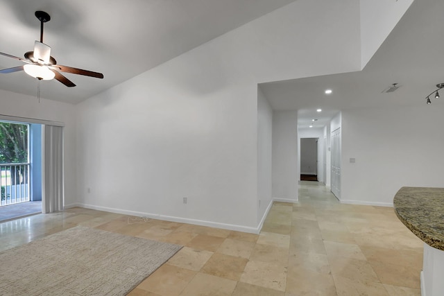 unfurnished room featuring a ceiling fan, recessed lighting, and baseboards