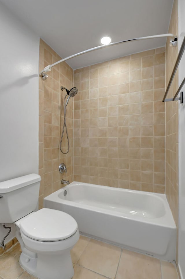 bathroom featuring tile patterned floors, toilet, tub / shower combination, and recessed lighting