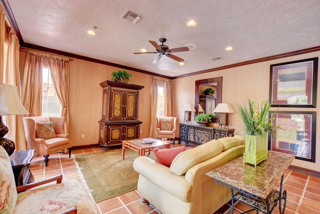 living room featuring plenty of natural light, ceiling fan, recessed lighting, crown molding, and baseboards