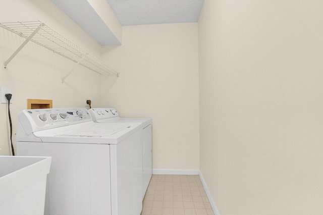 8074 Stirrup Cay Ct, Boynton Beach, FL 33436 - laundry area featuring separate washer and dryer and baseboards