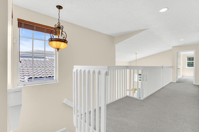8074 Stirrup Cay Ct, Boynton Beach, FL 33436 - hall featuring carpet, a textured ceiling, baseboards, recessed lighting, and lofted ceiling