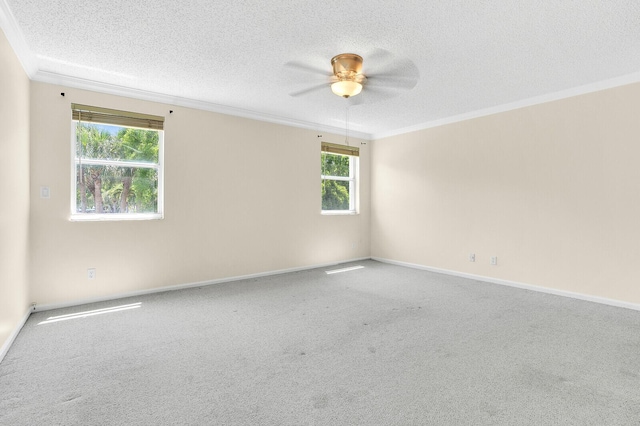 8074 Stirrup Cay Ct, Boynton Beach, FL 33436 - carpeted empty room featuring a textured ceiling, crown molding, ceiling fan, and baseboards