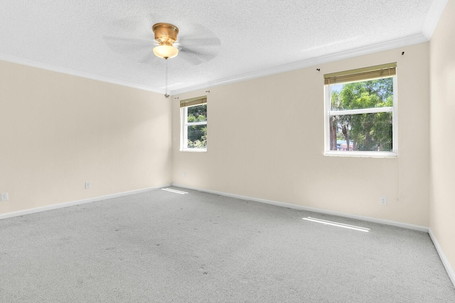 8074 Stirrup Cay Ct, Boynton Beach, FL 33436 - unfurnished room featuring a textured ceiling, crown molding, a ceiling fan, carpet flooring, and baseboards