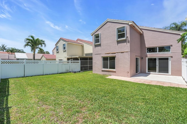 8074 Stirrup Cay Ct, Boynton Beach, FL 33436 - back of house with stucco siding and a patio