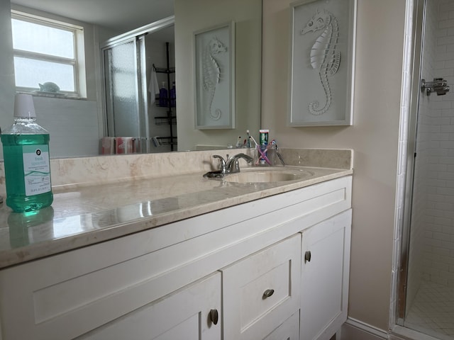 2950 Sunrise Lakes Dr W Unit 101, Sunrise, FL 33322 - bathroom featuring a stall shower and vanity
