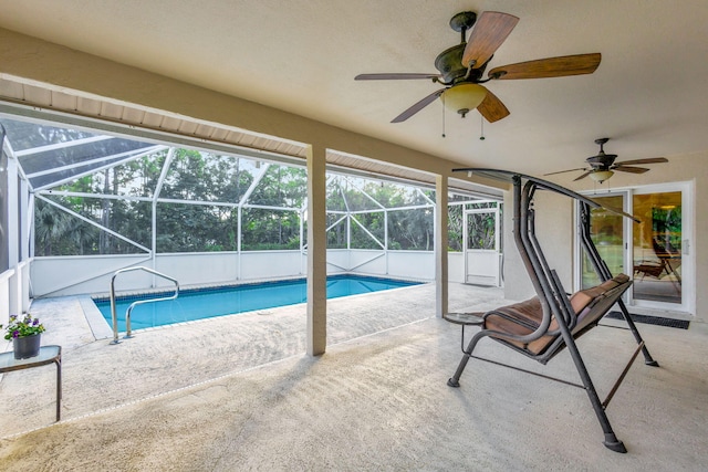 15550 73rd St N, The Acreage, FL 33470 - outdoor pool with a patio, a ceiling fan, and glass enclosure