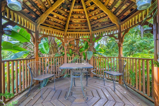 15550 73rd St N, The Acreage, FL 33470 - wooden terrace featuring a gazebo and outdoor dining area