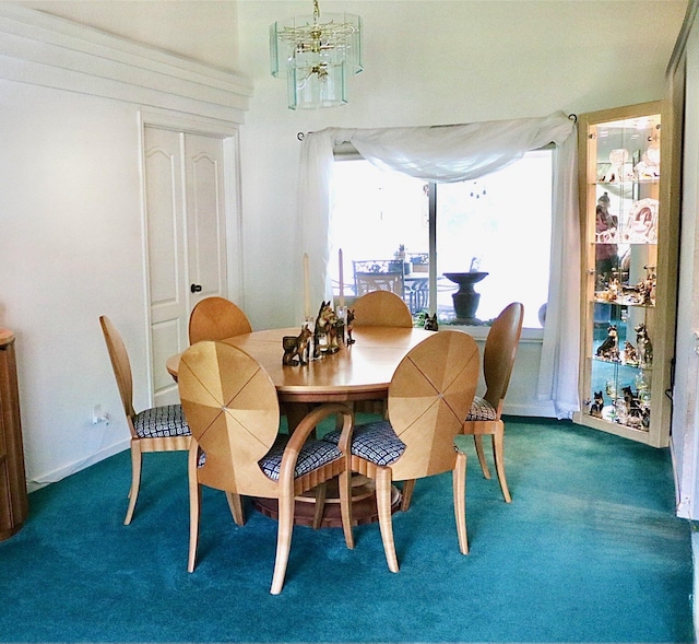 15550 73rd St N, The Acreage, FL 33470 - dining space featuring carpet flooring, baseboards, and a chandelier