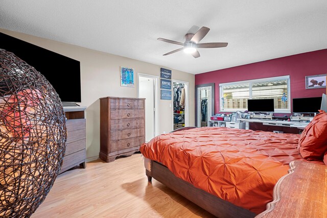 7503 NW 42nd St, Coral Springs, FL 33065 - bedroom featuring wood finished floors, ceiling fan, a spacious closet, and a closet