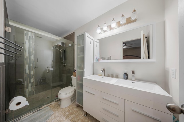7503 NW 42nd St, Coral Springs, FL 33065 - bathroom with toilet, a shower stall, vanity, and a ceiling fan