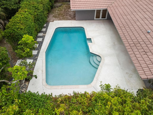 7503 NW 42nd St, Coral Springs, FL 33065 - outdoor pool with french doors