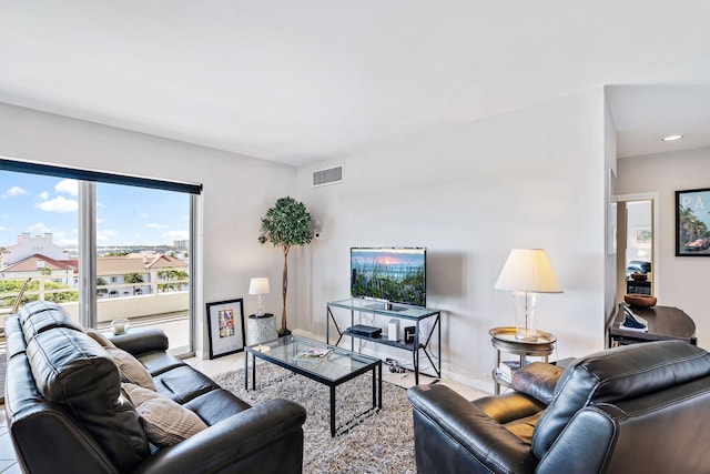 44 Cocoanut Row Unit 626B, Palm Beach, FL 33480 - tiled living room featuring baseboards