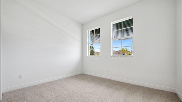 9143 SW Esule Way, Port Saint Lucie, FL 34987 - empty room featuring carpet floors and baseboards