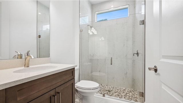 9143 SW Esule Way, Port Saint Lucie, FL 34987 - bathroom with toilet, a marble finish shower, and vanity