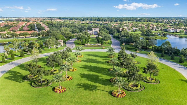 9143 SW Esule Way, Port Saint Lucie, FL 34987 - drone / aerial view of a nearby body of water and a tree filled landscape