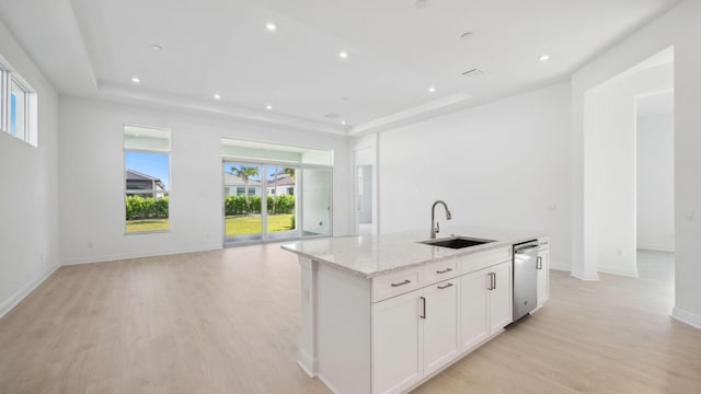 9143 SW Esule Way, Port Saint Lucie, FL 34987 - kitchen with a sink, open floor plan, stainless steel dishwasher, a kitchen island with sink, and healthy amount of natural light