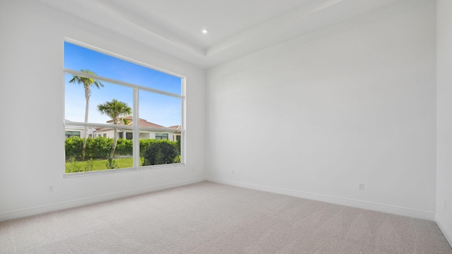 9143 SW Esule Way, Port Saint Lucie, FL 34987 - empty room featuring plenty of natural light, light colored carpet, baseboards, and recessed lighting