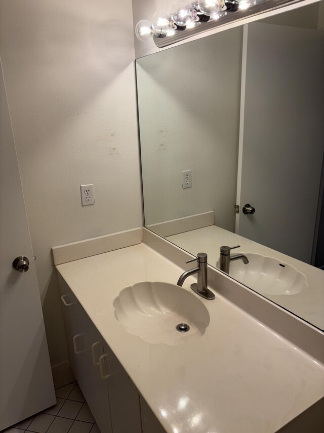 3962 Dafilee Cir, West Palm Beach, FL 33417 - bathroom with tile patterned flooring and vanity