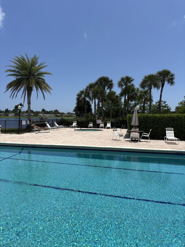3962 Dafilee Cir, West Palm Beach, FL 33417 - community pool featuring a patio area