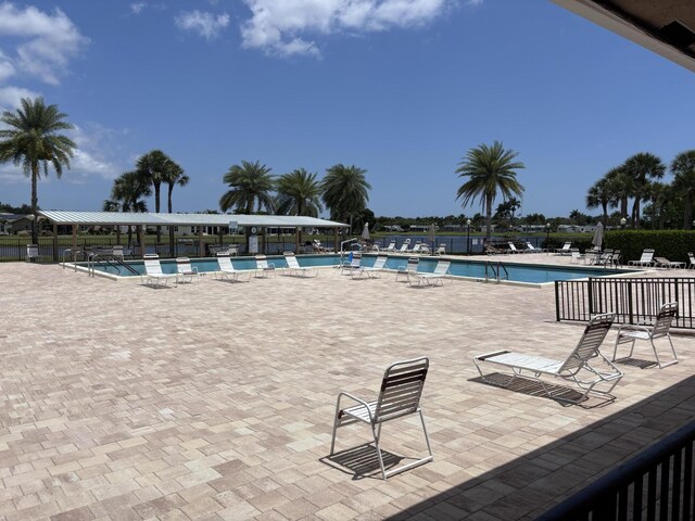 3962 Dafilee Cir, West Palm Beach, FL 33417 - workout area with baseboards